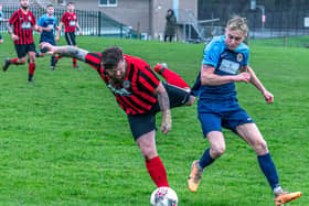 Sinnington, red and black kit, won 3-0 at home to Amotherby & Swinton Reserves in Beckett League Division Two on Saturday. PHOTO: BRIAN MURFIELD
