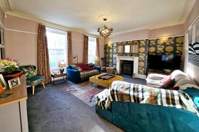 A reception room with period detail and decor.