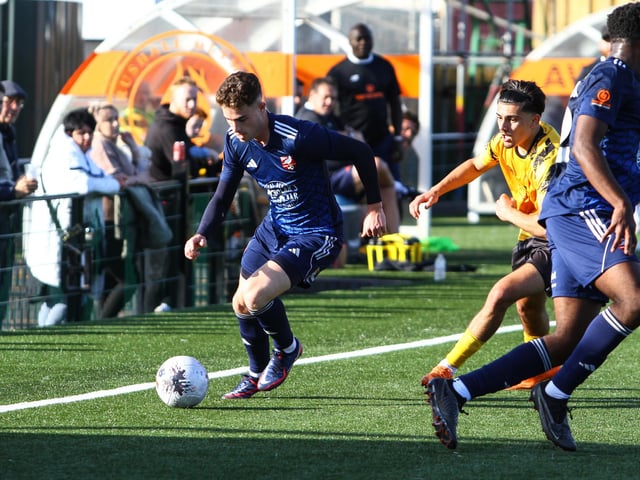 Dom Tear makes a run down the wing.