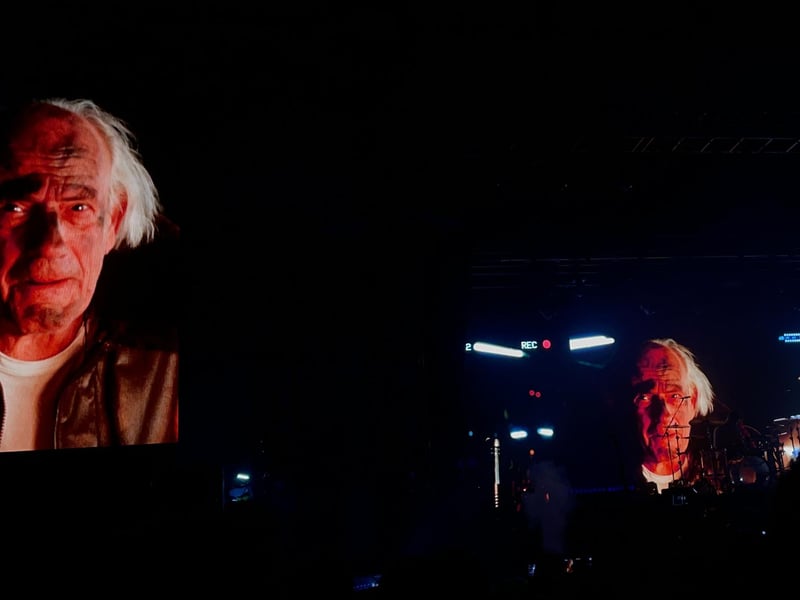 The band had a video introducing them onto the stage, which saw a scientist bringing them to 2023 from 2003.