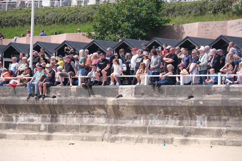 Spectators eagerly watching the race unfold.