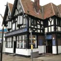 The installation of new floodlights and hanging signs at The Newcastle Packet pub has been approved by the council.