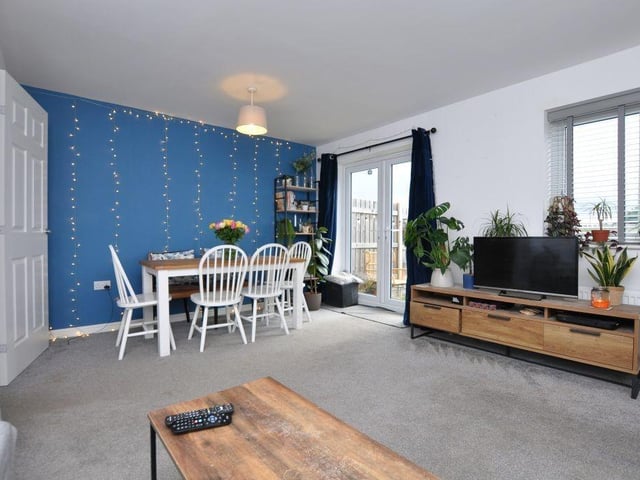 The dining room, through to the lounge, has french doors to an outside garden patio area.