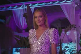 Love Island host Laura Whitmore arrives to kill the vibe at the VIP party with the result of the public vote (ITV)