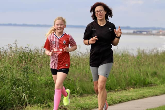 Lily Choat and mum Emma are all smiles running for BRR at Sewerby on Saturday morning.