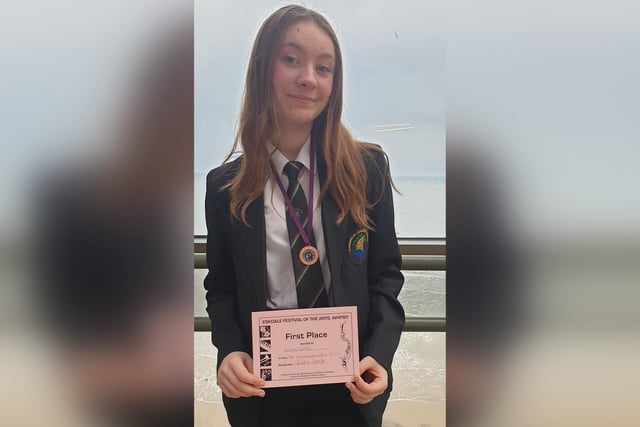 Caedmon College student Isabelle Beattie with her first place certificate.