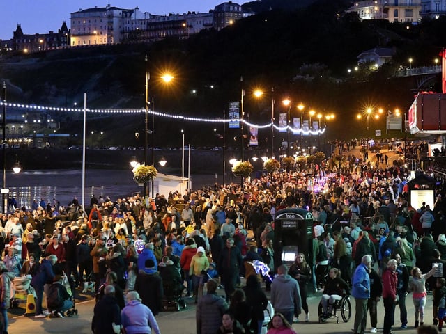 The crowds enjoy the parade.