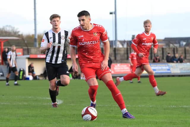 Michael Coulson in action for Brid Town
