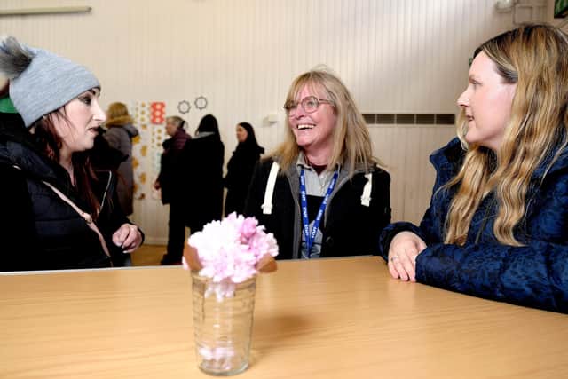 Catering teacher Sally Barton chatting with visitors