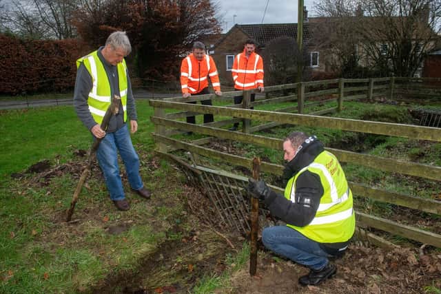 North Yorkshire Council’s executive member for managing our environment, Cllr Greg White, left in orange high-visibility jacket, and the authority’s former executive member for highways and transportation, Cllr Keane Duncan, right in orange high-visibility jacket