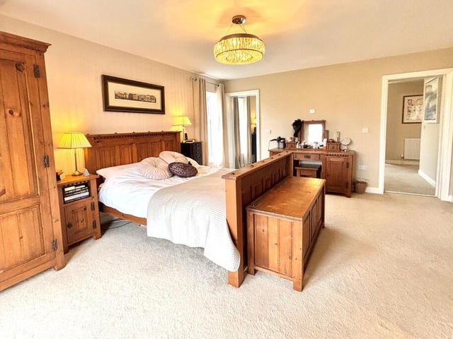 A large and attractive double bedroom.