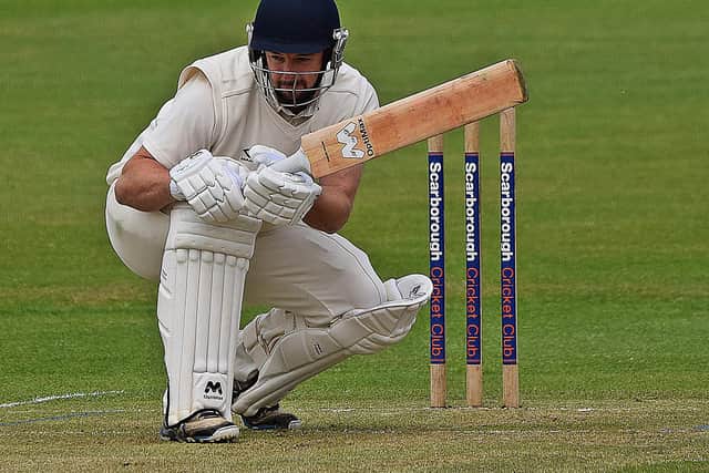 Rob Pinder takes evasive action against Driffield paceman James Anson.