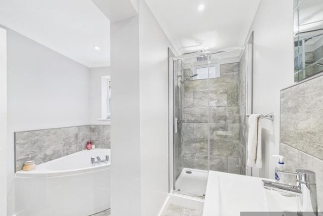 A modern bath and shower room.