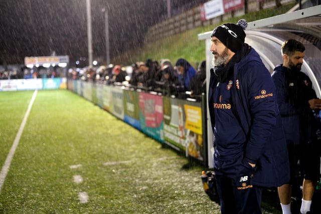 Scarborough Athletic manager Jonathan Greening takes in the action during his team's 2-1 home win against Peterborough Sports at a rainy Flamingo Land Stadium