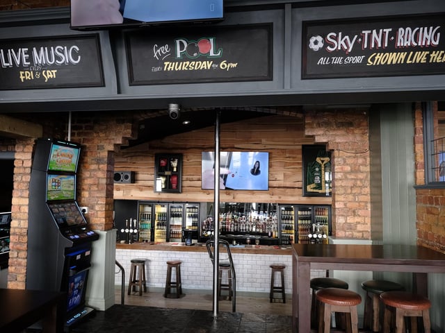 Memorabilia is displayed above the bar