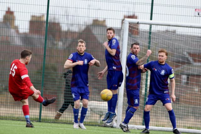 Wilberfoss take aim at the Bridlington Rovers Millau goal.