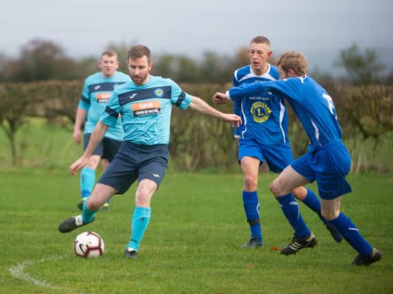 Ayton, light blue kit, claimed a cup win at Bagby
