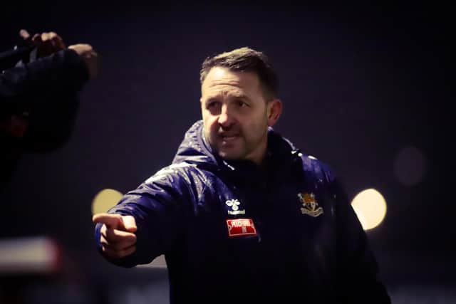 Brid Town boss Scott Kerr points the way for his players in the 9-0 win against Dunnington. Photo by Thomas Fynn