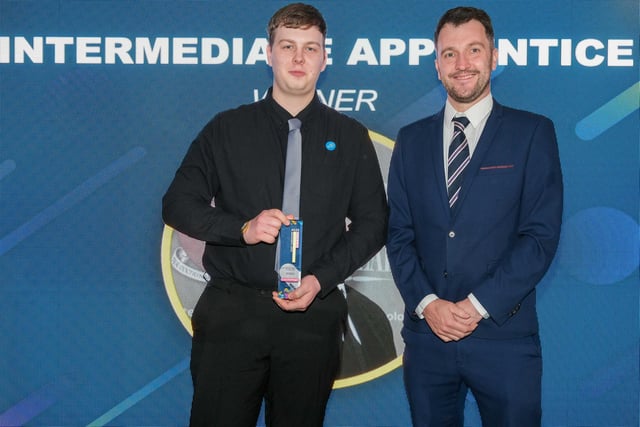 Intermediate Apprentice of the Year Award winner Luca McDougall, of Cranswick plc, is presented with his award by Chris Burn, business and features editor at the Yorkshire Post