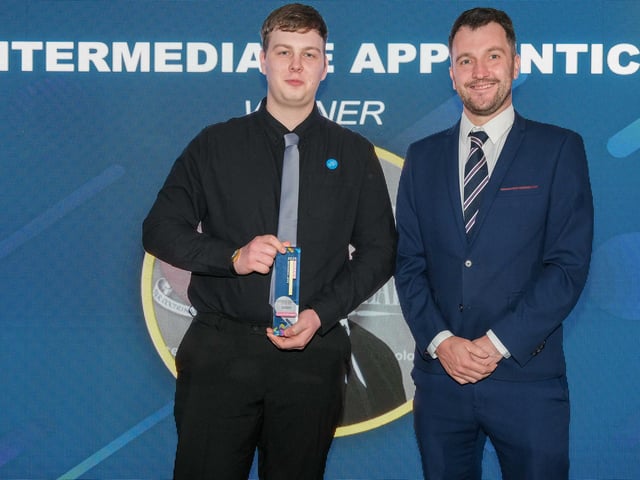 Intermediate Apprentice of the Year Award winner Luca McDougall, of Cranswick plc, is presented with his award by Chris Burn, business and features editor at the Yorkshire Post