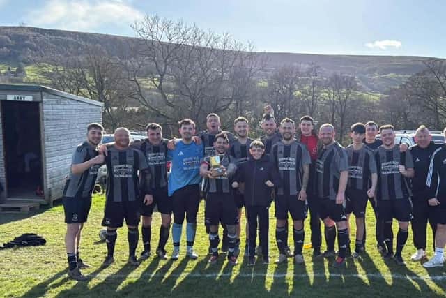 West Pier players celebrate winning the Newitts.com Beckett Football League Division One title with a 7-1 win at Rosedale,.