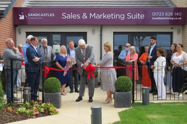 Cllr David Ireton, Chairman of North Yorkshire County Council, formally opening the Sandcastles development alongside Paula Broadbent, Managing Director of Later Living by Lovell.