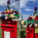 The colourful postbox topper on Whitby's West Cliff.