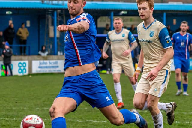 Connor Simpson on the attack for the Blues.