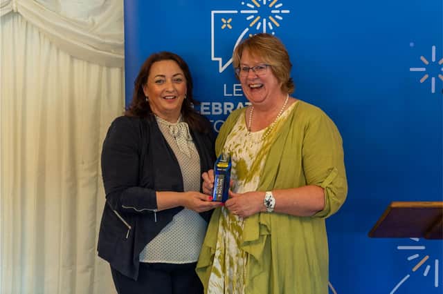 Sue Jefferson receives the award