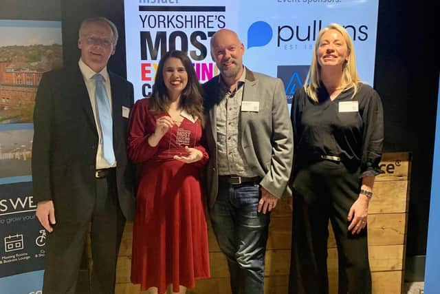 Lois and David Kirtland of Whitby's Hetty & Betty, with representatives from sponsors Pullen’s, receiving their award.