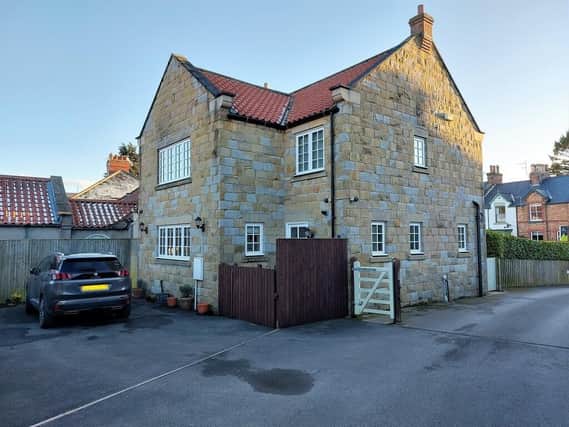 The attractive stone exterior of the property that's come up for sale in Scalby, Scarborough.