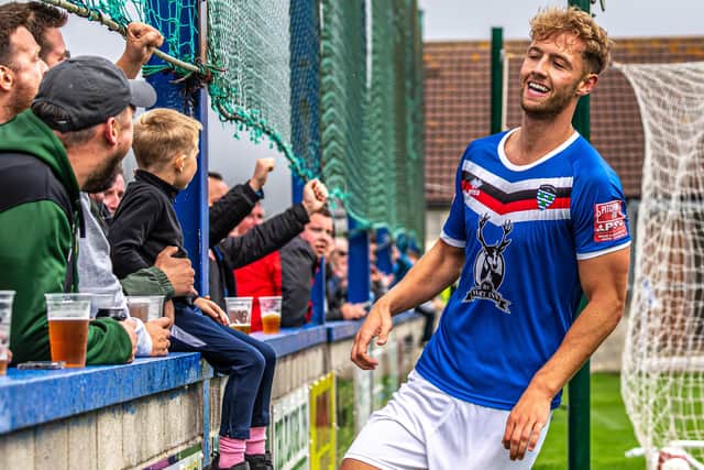 Connor Simpson celebrates opening the scoring for the home side.