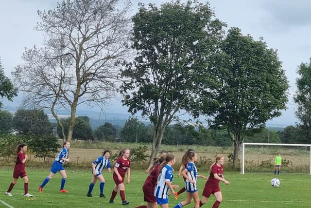 SLFC U13s Lionesses on the attack during their home win.