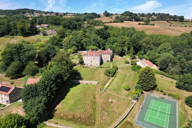 An aerial view of the property and its picturesque surroundings.
