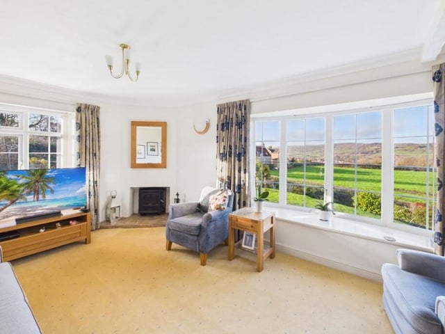 A bright, double aspect lounge with extensive views.