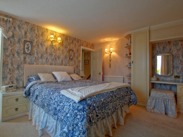 One of the double bedrooms within the village property.