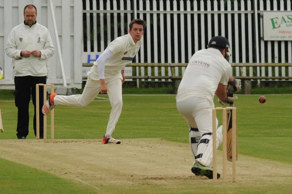 Harry Burton, in bowling action, impressed with the bat in the Evening League. Photo by Dom Taylor