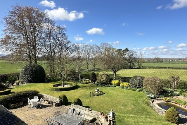 An overview of the garden and open fields beyond.