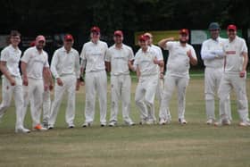 Pocklington CC 1sts celebrate taking a wicket during their home loss against Malton & Old Malton. Photo by Phil Gilbank
