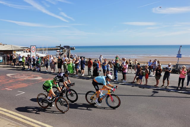 Harry Tanfield of Team TDT Unibet Cycling, James Fouche of Team Bolton Equities Black Spoke (Wearing the Pinarello King of the Mountains Jersey) and Nicolas Sessler of Team Global 6 Cycling in the breakaway passing through Bridlington.