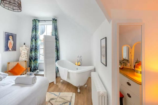 Two bedrooms on the second floor have free-standing, roll-top baths.