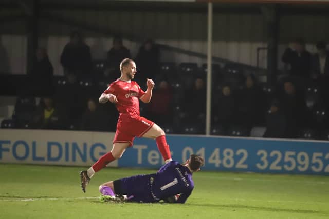 Bridlington Town striker Danny Earl, pictured in a one-on-one with the Ferriby keeper was sent off just before half-time. Photo by TCF Photography