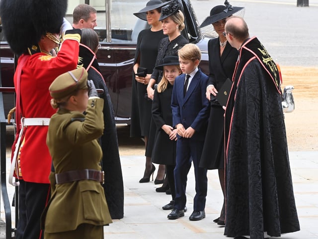 Prince George of Wales, Meghan, Duchess of Sussex, Sophie, Countess of Wessex and Catherine, Princess of Wales walk behind The Queen's funeral cortege borne on the State Gun Carriage of the Royal Navy as it proceeds towards Westminster Abbey. (Photo by Geoff Pugh - WPA Pool/Getty Images)