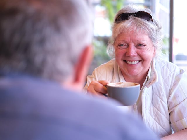 Some of the first customers enjoying a coffee.