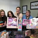 Pupils Charleigh Doubtfire and Ocean Isherwood with staff Jennie Rogers, Jo Foc and Charlotte Oldham.