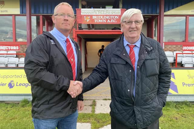 Bridlington Town FC main stand has been named after their chairman Peter Smurthwaite, right
