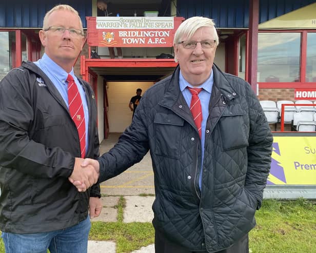 Bridlington Town FC main stand has been named after their chairman Peter Smurthwaite, right