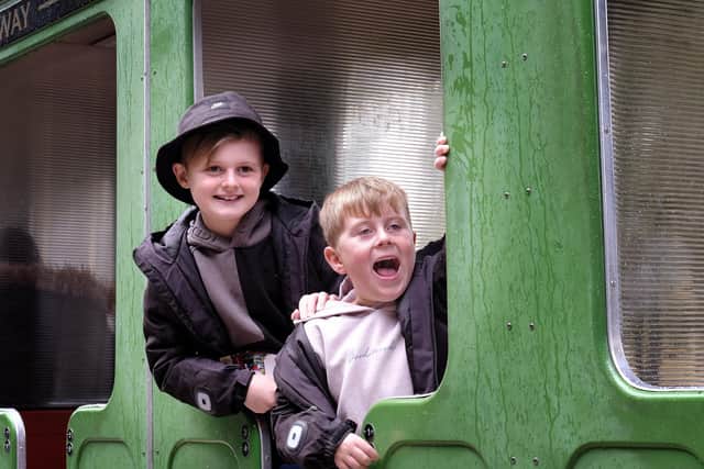 Rowan and Zavier having fun despite the rain