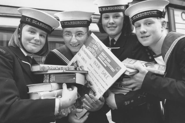 Scarborough Sea Cadets, from left, Natalie Cooper, Matthew Bedford, Tracy Mills and Chris Leng, prepared to open their book shop on St Thomas Street back in August, 1993. 