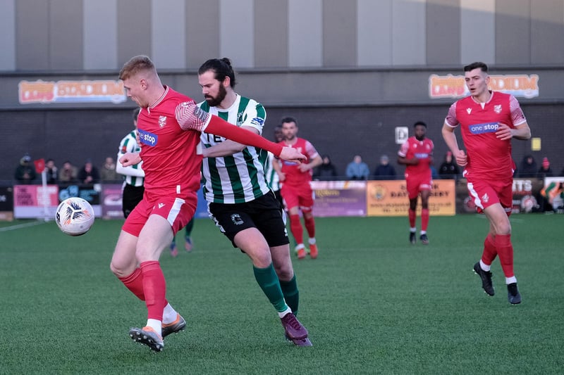The match-winner Alex Wiles holds off a Blyth Spartans rival